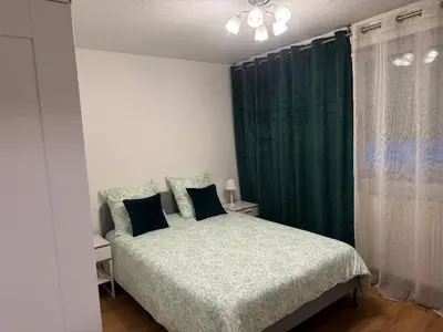 Un ou plusieurs lits dans un hébergement de l'établissement Sion City Mulhouse centre - parking et balcon-wifi 5G gratuit