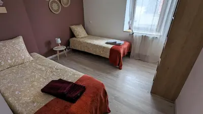 Un ou plusieurs lits dans un hébergement de l'établissement Pro & Loisirs, 2 Chambres, Clim, WiFi