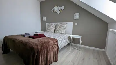Un ou plusieurs lits dans un hébergement de l'établissement Pro & Loisirs, 2 Chambres, Clim, WiFi