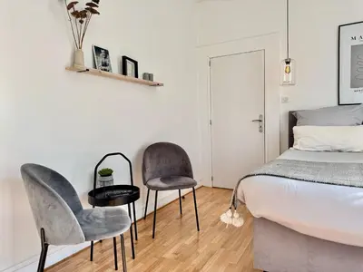 Un ou plusieurs lits dans un hébergement de l'établissement Bonjour Colmar