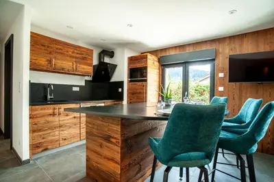 Cuisine ou kitchenette dans l'établissement Le Refuge