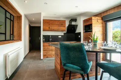 Cuisine ou kitchenette dans l'établissement Le Refuge