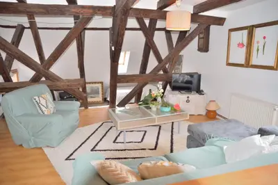 Coin salon dans l'établissement L'APPARTEMENT