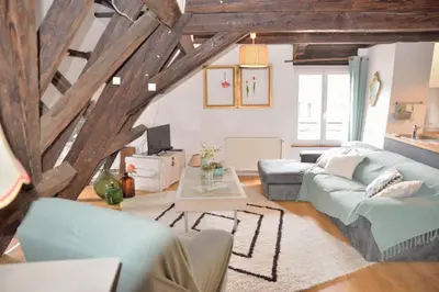 Coin salon dans l'établissement L'APPARTEMENT