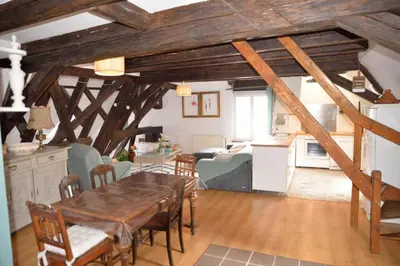 Coin salon dans l'établissement L'APPARTEMENT