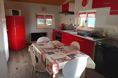 Cuisine ou kitchenette dans l'établissement Le Chalet du bonheur , individuel avec belle vue
