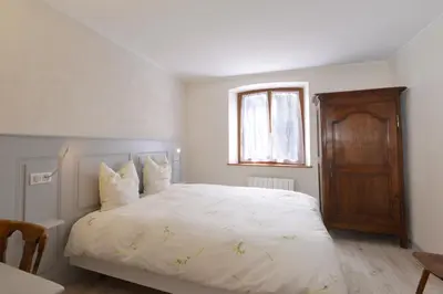 Un ou plusieurs lits dans un hébergement de l'établissement La Maison Oberlin