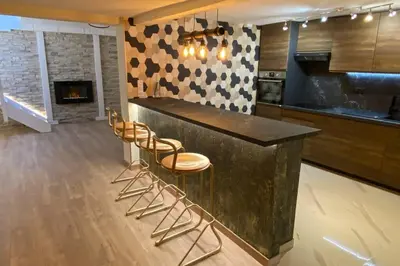 Cuisine ou kitchenette dans l'établissement SPA de charme 6 pers avec Jacuzzi & Sauna privatifs au coeur de ville - Esprit Coco