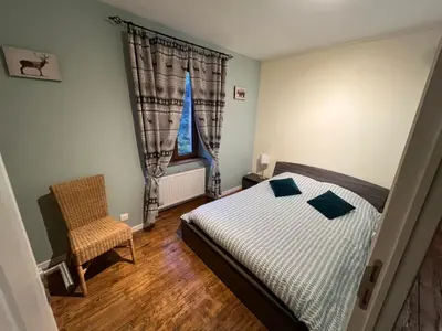 Un ou plusieurs lits dans un hébergement de l'établissement Gîte de charme jusqu'à 14 personnes, Proche du lac de Gérardmer