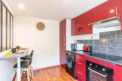 Cuisine ou kitchenette dans l'établissement Le 02-GregIMMO-Appart'Hôtel