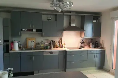 Cuisine ou kitchenette dans l'établissement Superbe Duplex au Nouveau Bassin avec vue superbe