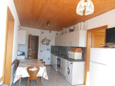 Cuisine ou kitchenette dans l'établissement bouton d or