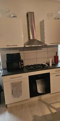 Cuisine ou kitchenette dans l'établissement Duplex de 120 m2 7 Pers-Centre-Parking Privé