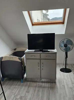 Télévision ou salle de divertissement dans l'établissement Duplex de 120 m2 7 Pers-Centre-Parking Privé