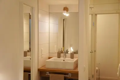 Salle de bains dans l'établissement La Cour du Vignoble