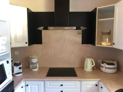 Cuisine ou kitchenette dans l'établissement Ma Jolie Camyna