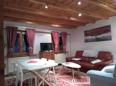 Coin salon dans l'établissement Gites Aux Fines Bulles d'Alsace spa en supplément