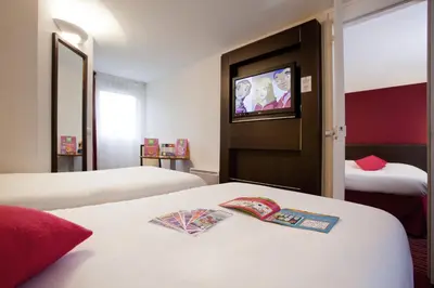 Un ou plusieurs lits dans un hébergement de l'établissement ibis Styles Belfort Centre