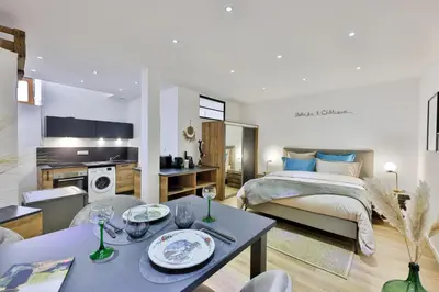 Un ou plusieurs lits dans un hébergement de l'établissement Studio des 3 Châteaux
