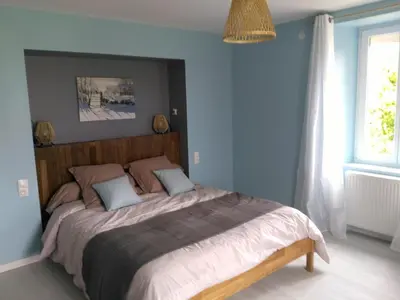 Un ou plusieurs lits dans un hébergement de l'établissement Les Chambres d Odile