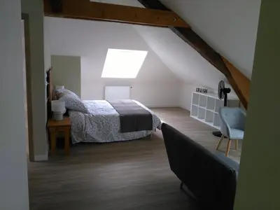 Un ou plusieurs lits dans un hébergement de l'établissement Les Chambres d Odile