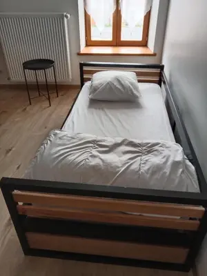 Un ou plusieurs lits dans un hébergement de l'établissement LE GELEINFÊTE I - GÎTE VOSGES à proximité de GERARDMER