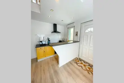 Cuisine ou kitchenette dans l'établissement Maisonnette Le Faubourg - CENTRE VILLE, TERRASSE ET NETFLIX