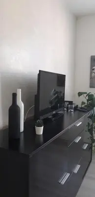 Télévision ou salle de divertissement dans l'établissement COSY F3 PROCHE CENTRE