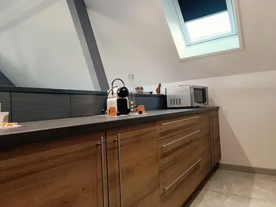Cuisine ou kitchenette dans l'établissement Le Studio D'Edouard