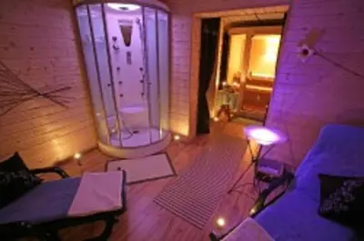 Coin salon dans l'établissement Chalet Résidence La Combeauté