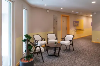 Coin salon dans l'établissement LE JARDIN D'EDO
