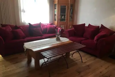 Coin salon dans l'établissement La Maison du Rempart
