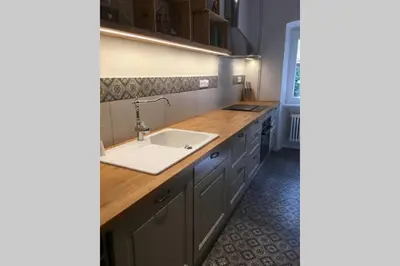 Cuisine ou kitchenette dans l'établissement La Maison du Rempart