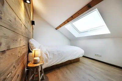 Un ou plusieurs lits dans un hébergement de l'établissement Superbe appartement, hypercentre au calme avec bain balnéo