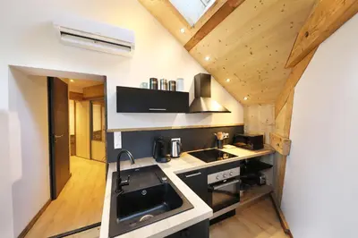Cuisine ou kitchenette dans l'établissement Superbe appartement, hypercentre au calme avec bain balnéo