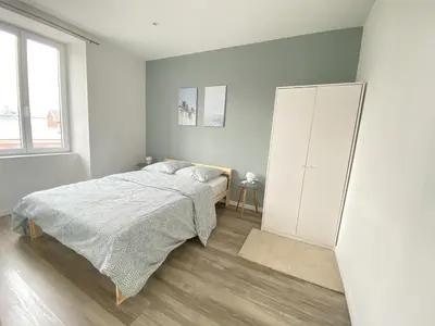 Un ou plusieurs lits dans un hébergement de l'établissement Magnifique T2 40m2 lumineux, moderne et rénové avec fibre