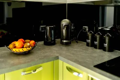 Cuisine ou kitchenette dans l'établissement La Villetta G Blotzheim - Appartement de Standing