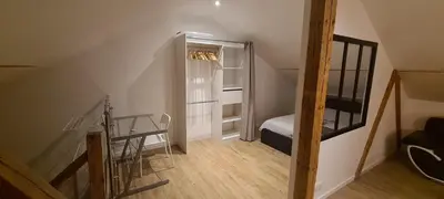 Un ou plusieurs lits dans un hébergement de l'établissement Wood loft by Mulhouse