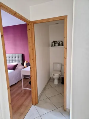 Un ou plusieurs lits dans un hébergement de l'établissement Cosy Appartement Complet centre-ville Montbéliard