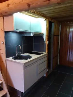 Cuisine ou kitchenette dans l'établissement Esprit Myrtille Balcon Vue lac