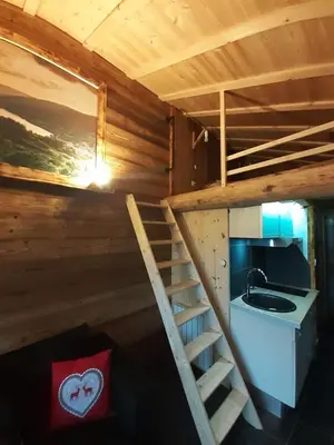 Télévision ou salle de divertissement dans l'établissement Esprit Myrtille Balcon Vue lac