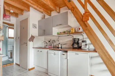 Cuisine ou kitchenette dans l'établissement Le Lutin