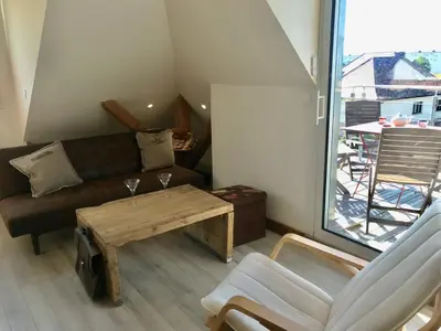 Coin salon dans l'établissement Appartement chaleureux et lumineux avec vue ! au centre Alsace