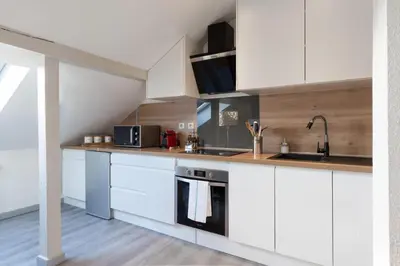 Cuisine ou kitchenette dans l'établissement Hearten - Mulhouse bnb