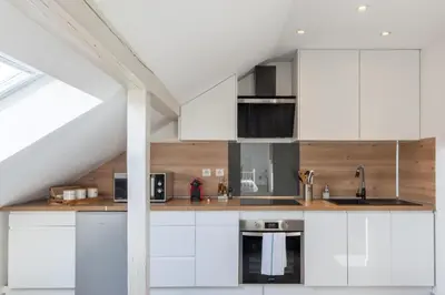 Cuisine ou kitchenette dans l'établissement Hearten - Mulhouse bnb