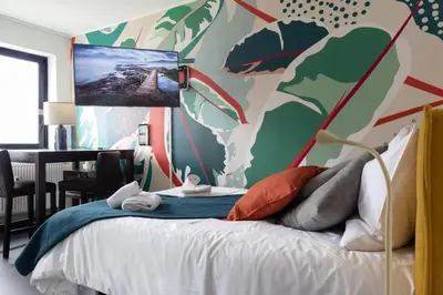 Un ou plusieurs lits dans un hébergement de l'établissement Travel Homes - Le Wiltwo, nouveau face à la gare