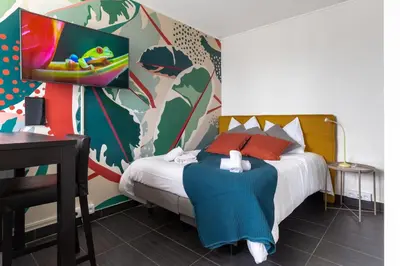 Un ou plusieurs lits dans un hébergement de l'établissement Travel Homes - Le Wiltwo, nouveau face à la gare