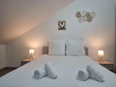 Un ou plusieurs lits dans un hébergement de l'établissement Le Ruisseau à Bussang Htes Vosges tout confort