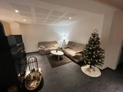 Coin salon dans l'établissement Le Ruisseau à Bussang Htes Vosges tout confort