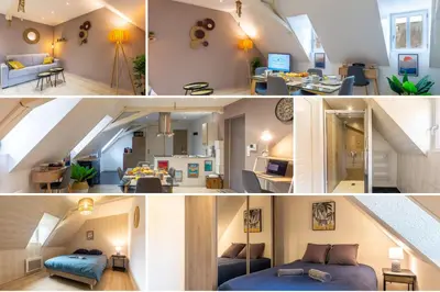 Un ou plusieurs lits dans un hébergement de l'établissement Le 32-GregIMMO-Appart'Hôtel